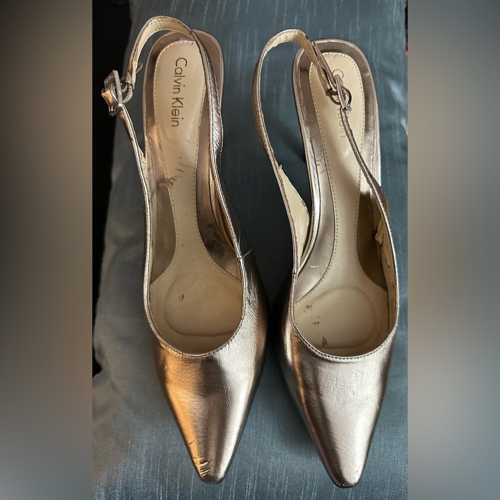 Calvin Klein size 8.5/3.5in heels/inside peelings/excellent outer condition.
